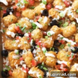 Overhead Totchos - Tater Tot Nachos on sheet pan