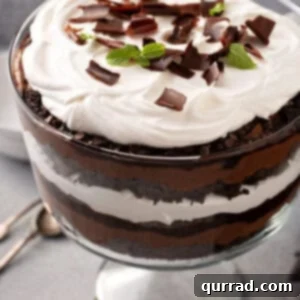 Death By Chocolate Trifle with chocolate shavings on top in trifle bowl