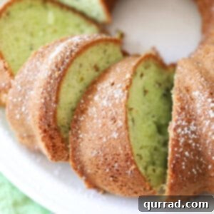 Effortless Pistachio Delight 3 Overhead view of a perfectly baked Pistachio Cake in a bundt pan, ready to be sliced and served.