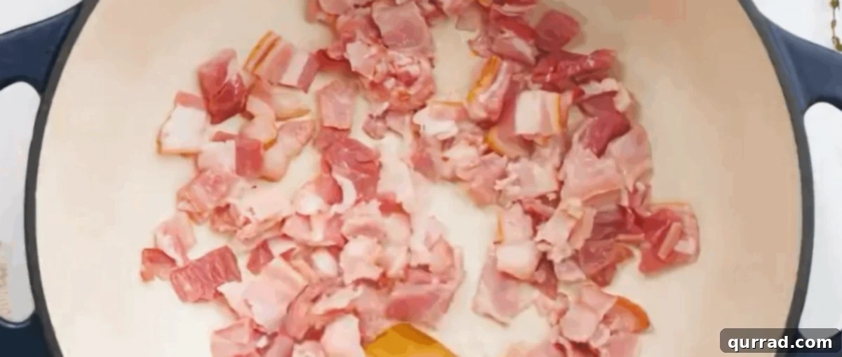 Creamy Golden Corn Chowder 4 Cooking diced bacon in a large heavy soup pot until crispy.
