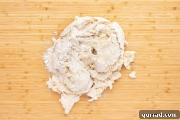 shaggy sandwich bread dough on cutting board