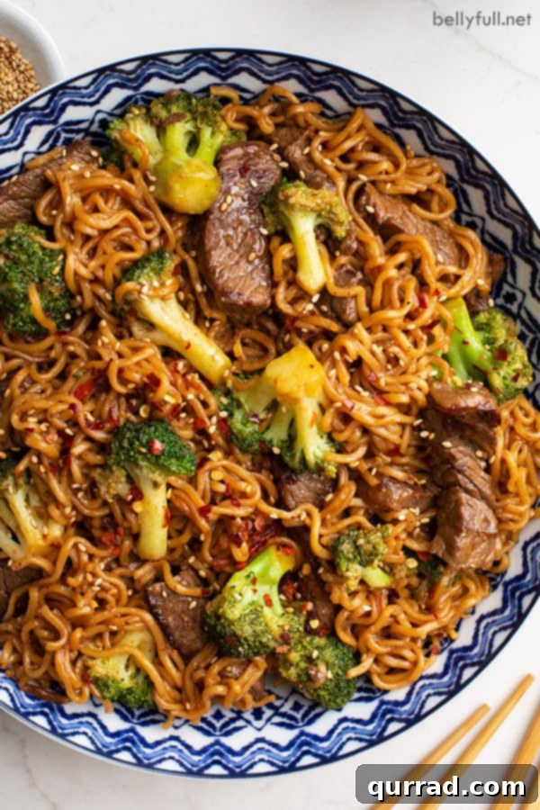 Overhead picture of homemade beef and broccoli ramen stir fry, ready to be portioned and enjoyed.