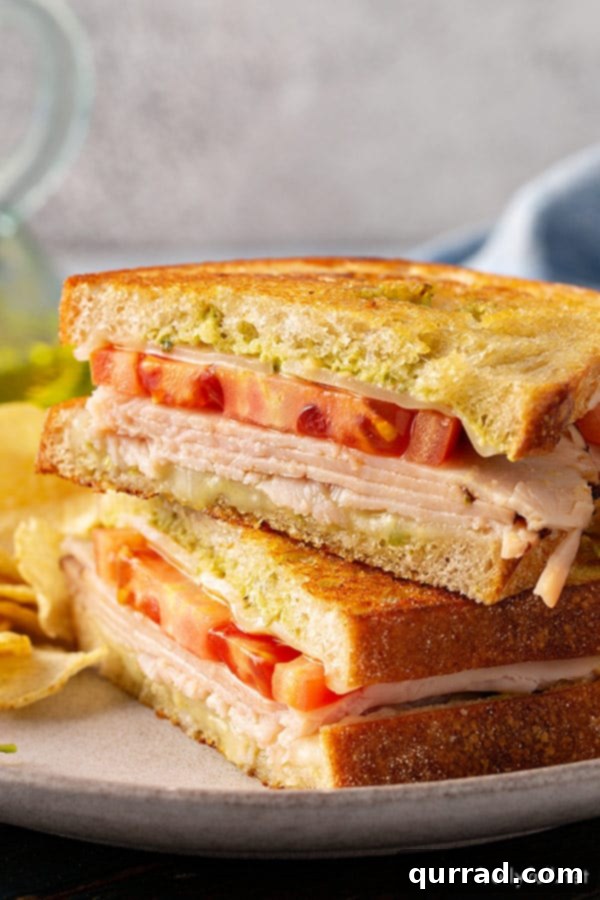 Elevate Your Grilled Cheese Game 2 Gourmet Pesto Grilled Cheese Sandwich with Turkey and Tomato