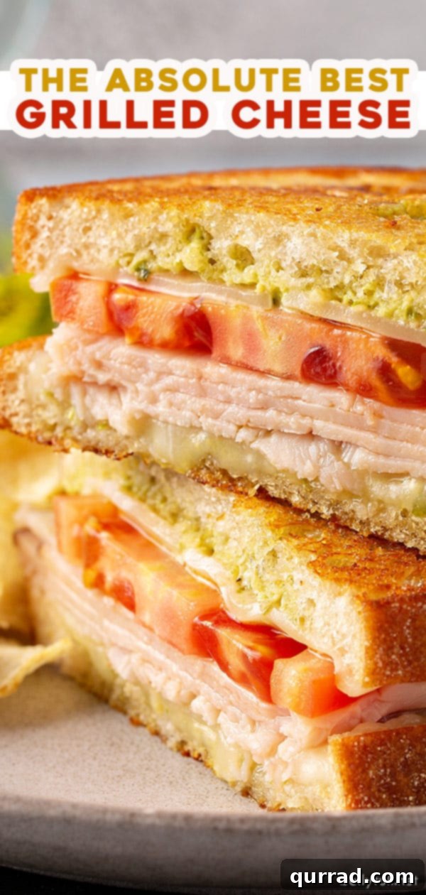 Elevate Your Grilled Cheese Game 7 Long pin image for gourmet pesto grilled cheese sandwich