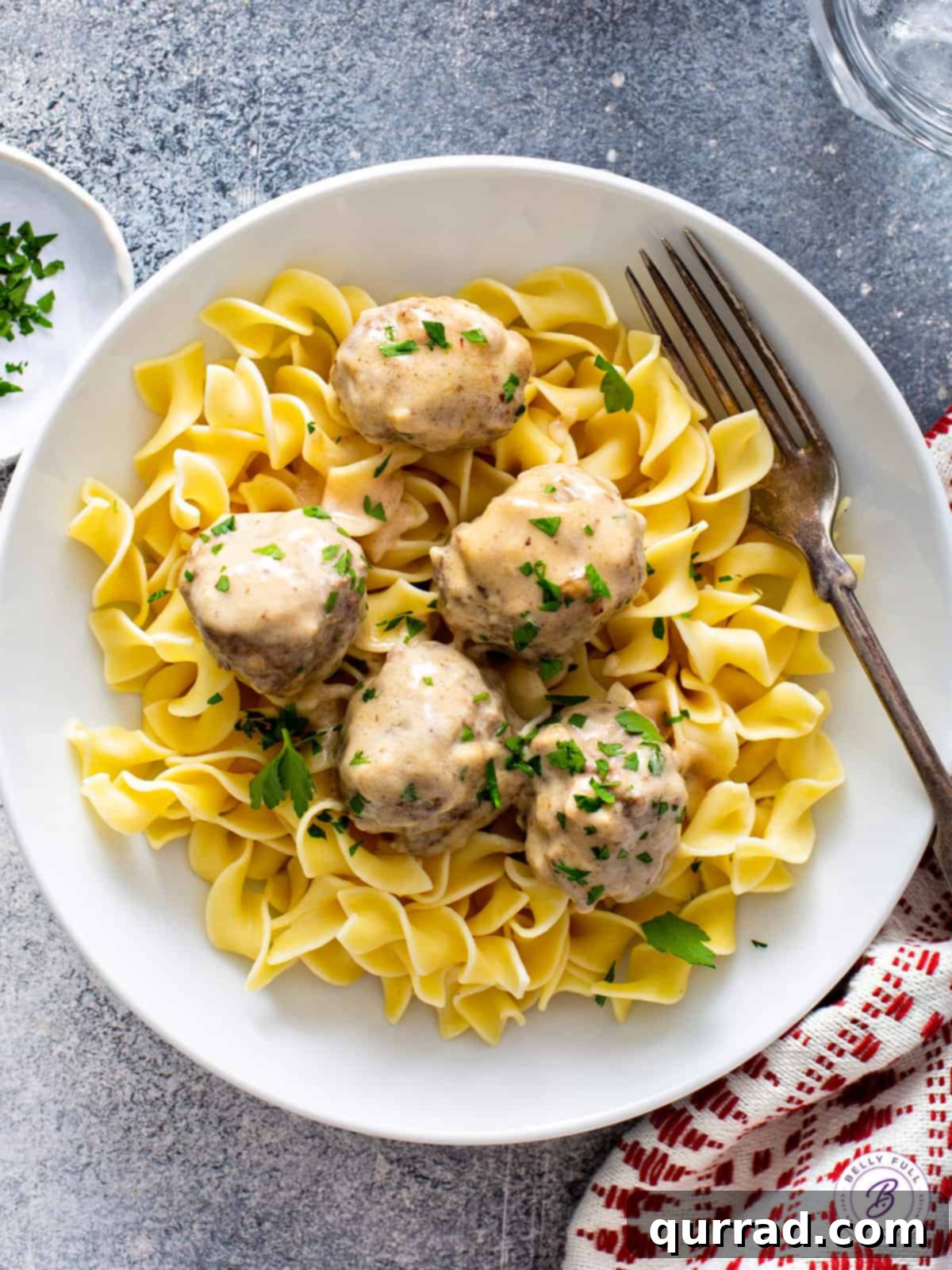 Creamy Swedish Meatballs 5 Five delicious Swedish Meatballs generously coated in creamy gravy, served over a bed of pasta.