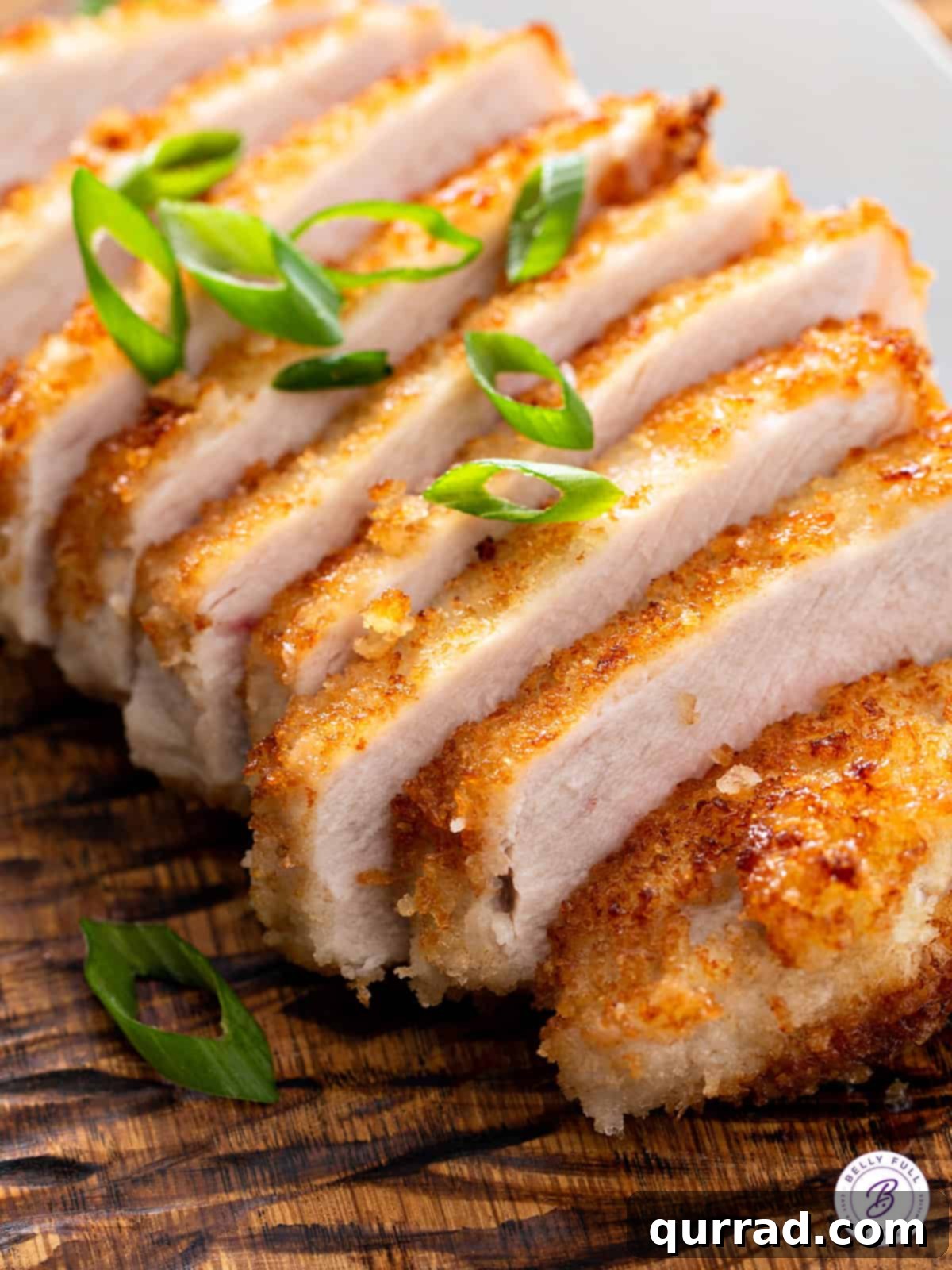 Crispy Pork Cutlet Delights 2 sliced golden panko crusted pork cutlet, ready to be served