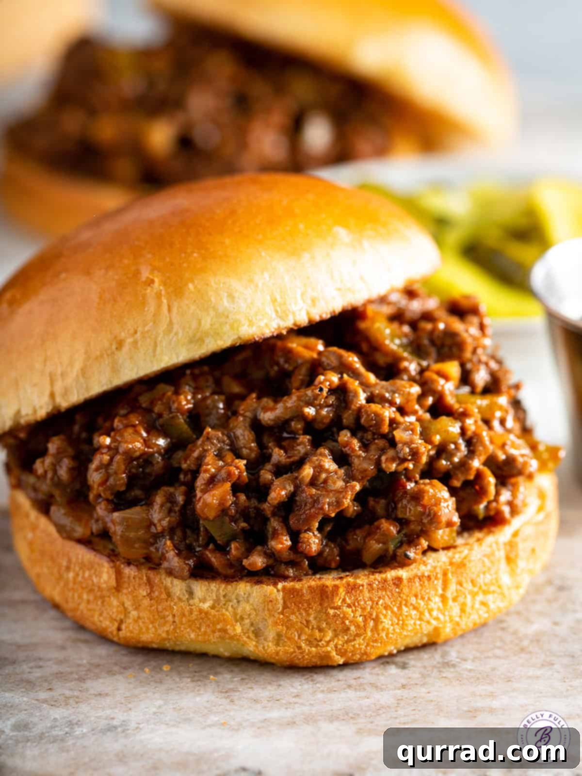 Quick and Craveable Sloppy Joes 2 Close-up of a perfectly crafted homemade sloppy joe sandwich on a toasted bun, showcasing the rich, savory meat mixture.
