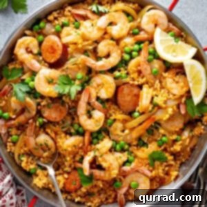 Shrimp and Chorizo Paella cooked in a paella pan.