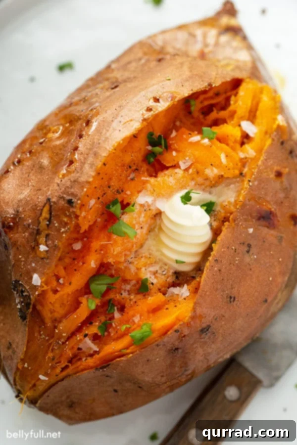 Sweet Potato Perfection 2 overhead of baked sweet potato split open with a dap of butter