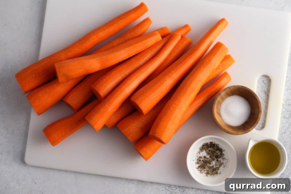 Golden Roasted Carrots 4 Twelve medium to large carrots, trimmed and peeled, lying ready for slicing on a cutting board.