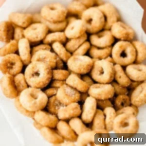 Hot Buttered Doughnut O's 6 mini doughnut hot buttered Cheerios close up in paper cup