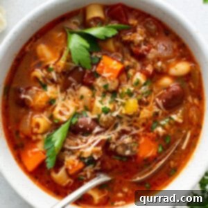 Homemade Olive Garden Pasta Fagioli Soup 6 overhead of pasta fagioli in bowl with spoon