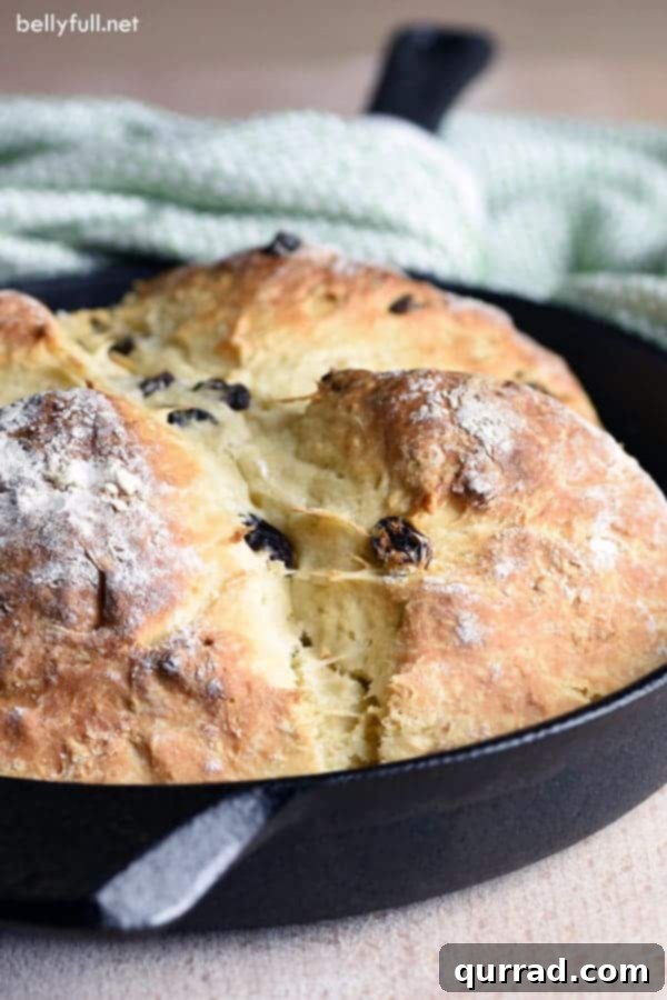 Delicious Irish Soda Bread, warm from the oven, ready to be slathered with butter.