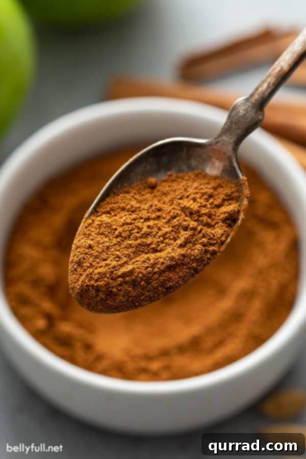 Signature Apple Pie Spice Blend 5 close up of apple pie spice on spoon