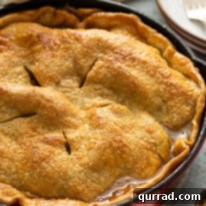 side angle of easy apple pie with gooey caramel