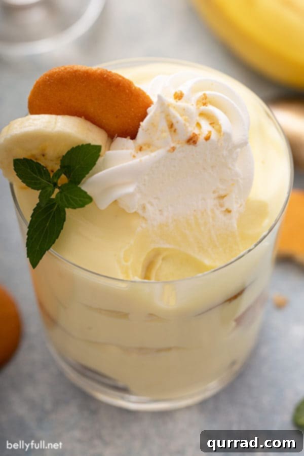 glass of pudding with bite taken