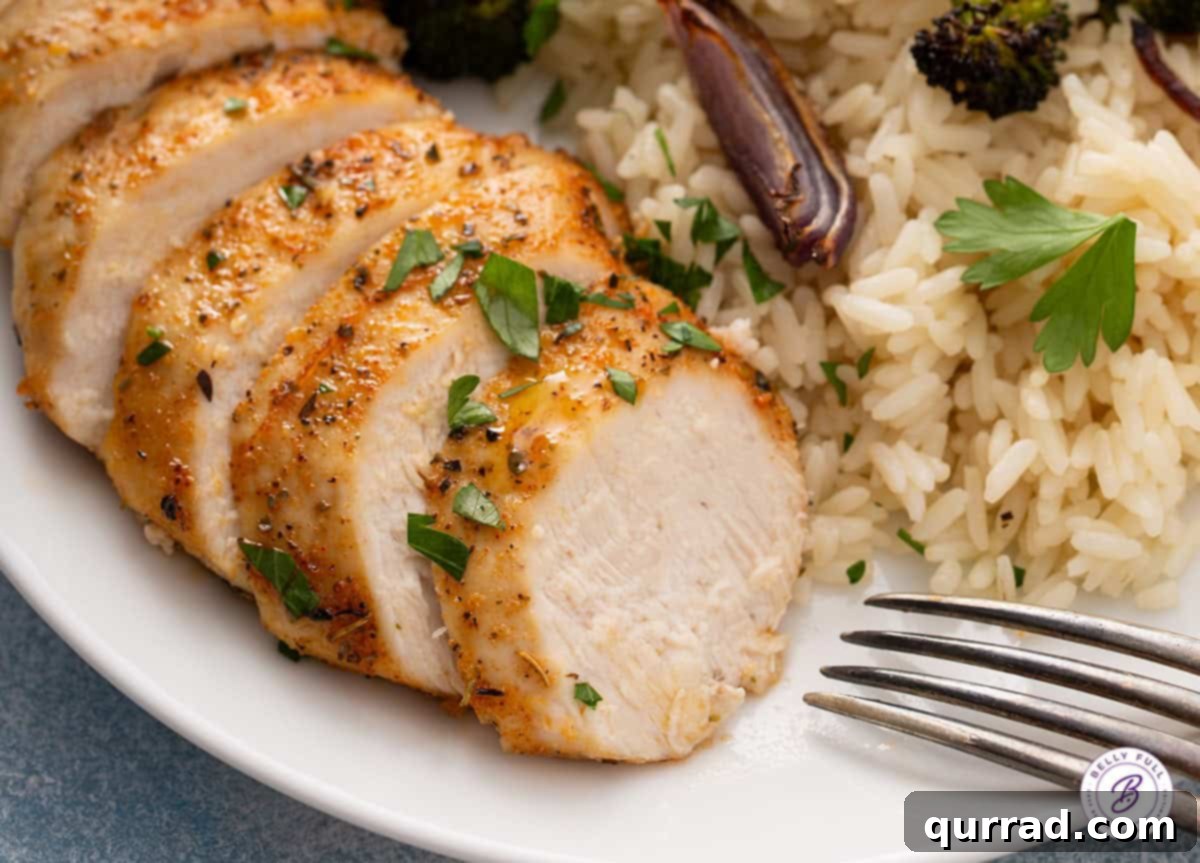 sliced baked chicken breast on plate
