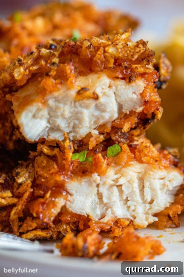 Air Fryer BBQ Chicken Tenders 3 close up of potato chip crusted air fryer chicken tenders split in half