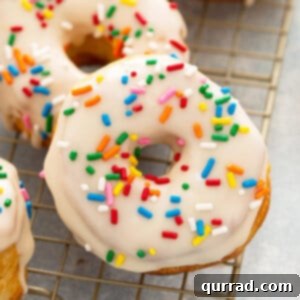 Quick Air Fryer Donut Delight 3 Close up glazed air fryer donuts with sprinkles