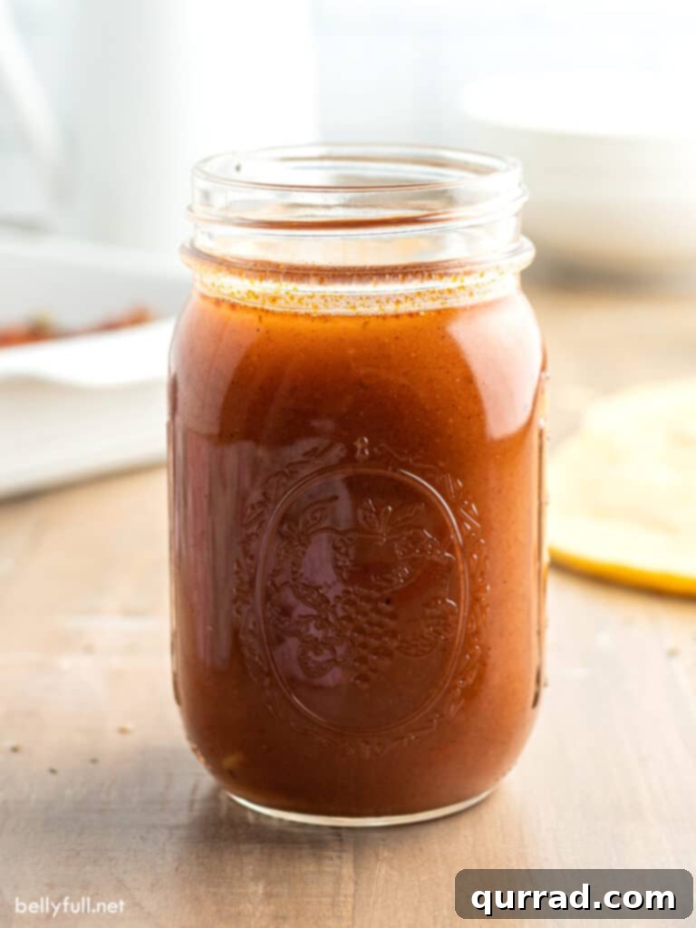 Authentic Homemade Enchilada Sauce 2 Homemade red enchilada sauce in a mason jar