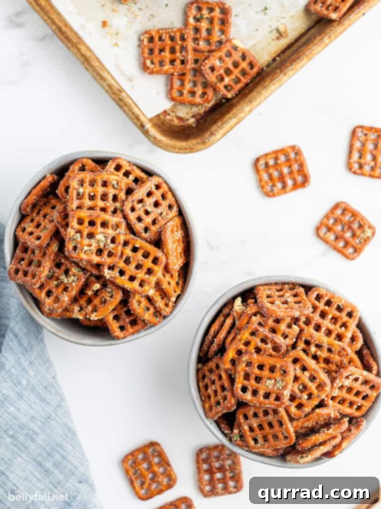 Zesty Ranch Pretzels 2 Two bowls overflowing with perfectly seasoned Ranch Pretzels, ready for snacking.