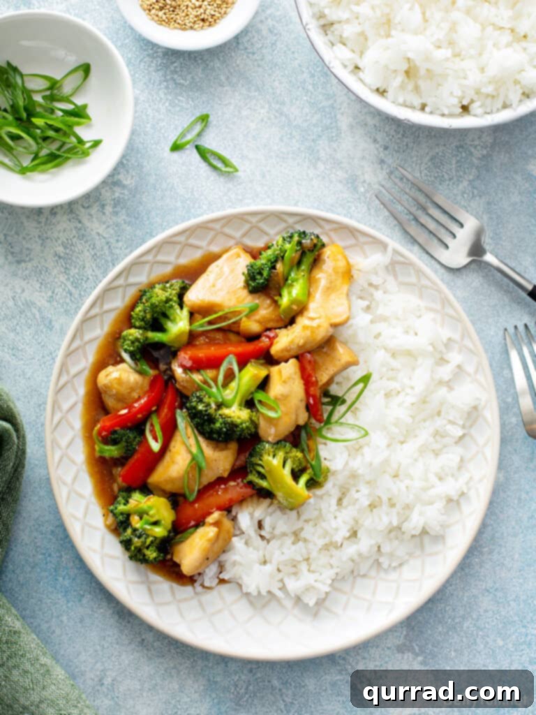 Quick Chicken Stir-Fry 3 overhead chicken and veggie stir fry on plate with white rice