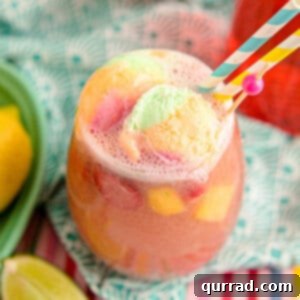 sherbet punch in glass with striped straws