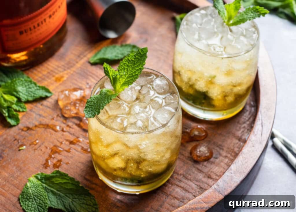 Southern Minted Sip 4 Mint Juleps on a wooden lazy susan, ready to serve at a gathering