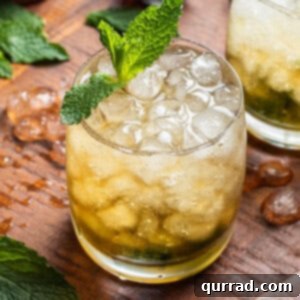 Southern Minted Sip 5 Mint julep cocktail on wooden board