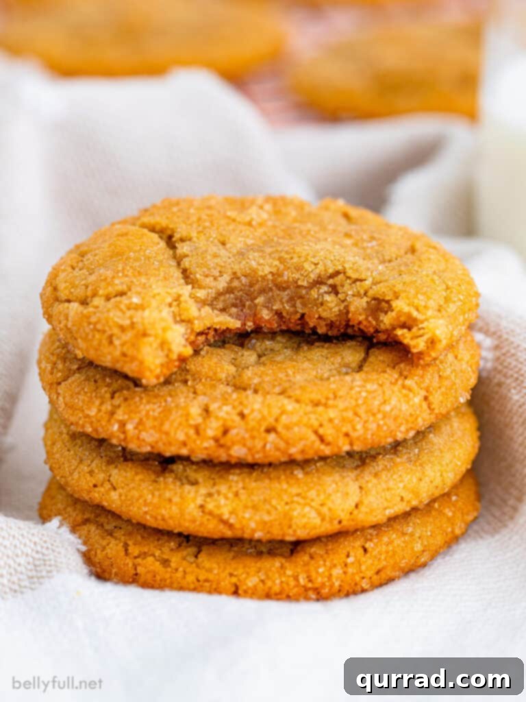 Golden Brown Sugar Delights 4 stack of 4 brown sugar cookies with top one bite taken