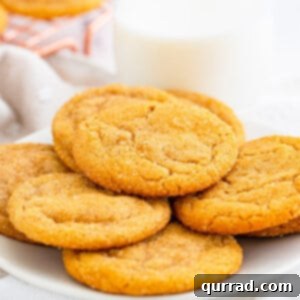 Golden Brown Sugar Delights 6 pile of brown sugar cookies on white plate