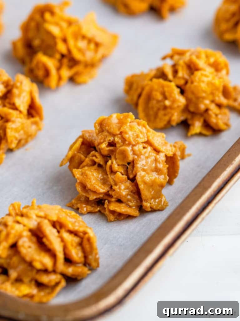 Crispy Cornflake Treats 2 cornflake cookies on parchment paper