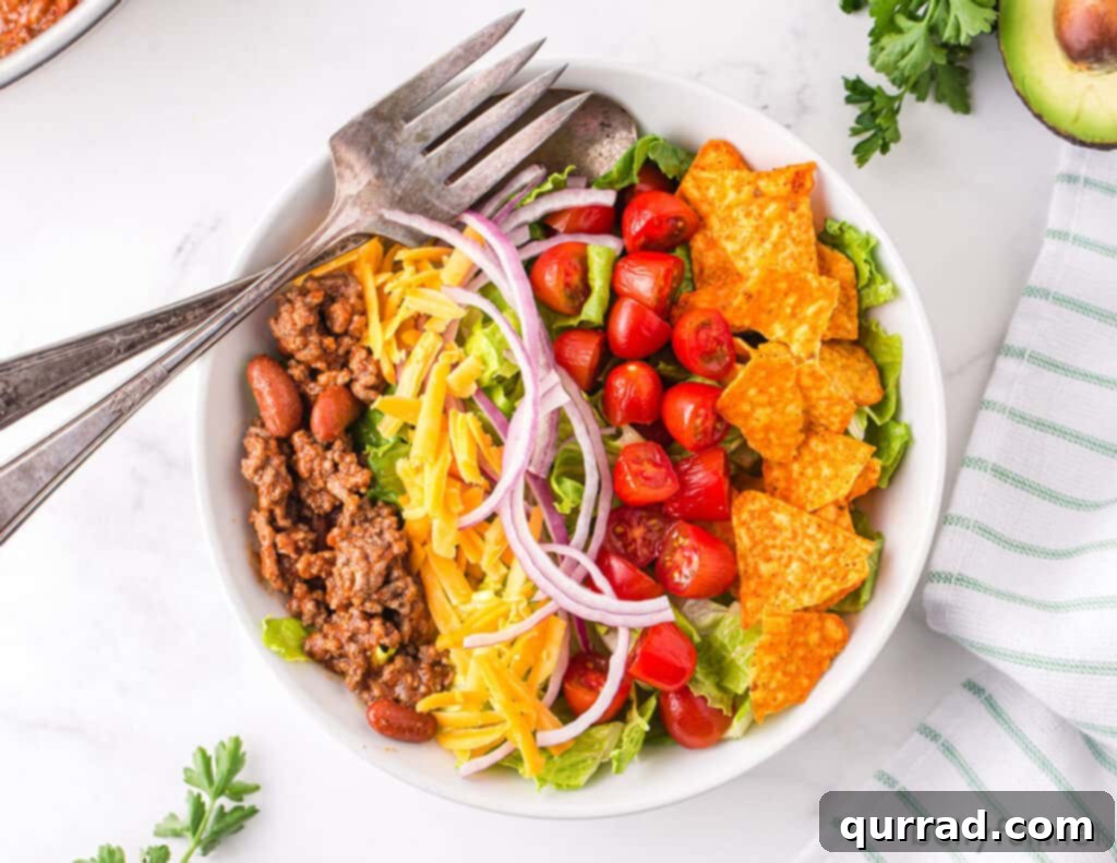 overhead taco salad in white bowl