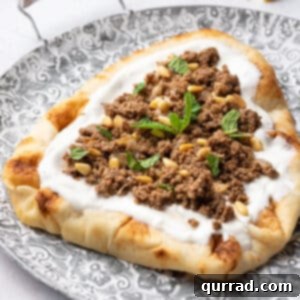 Indian keema on yogurt naan bread