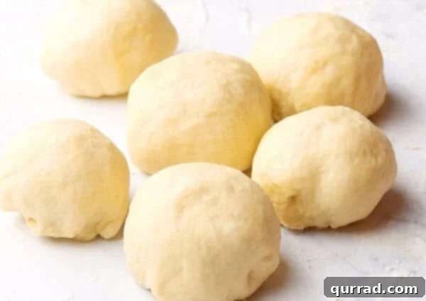 Pillowy Indian Flatbread 9 8 small, smooth mounds of dough, perfectly shaped and ready for flattening