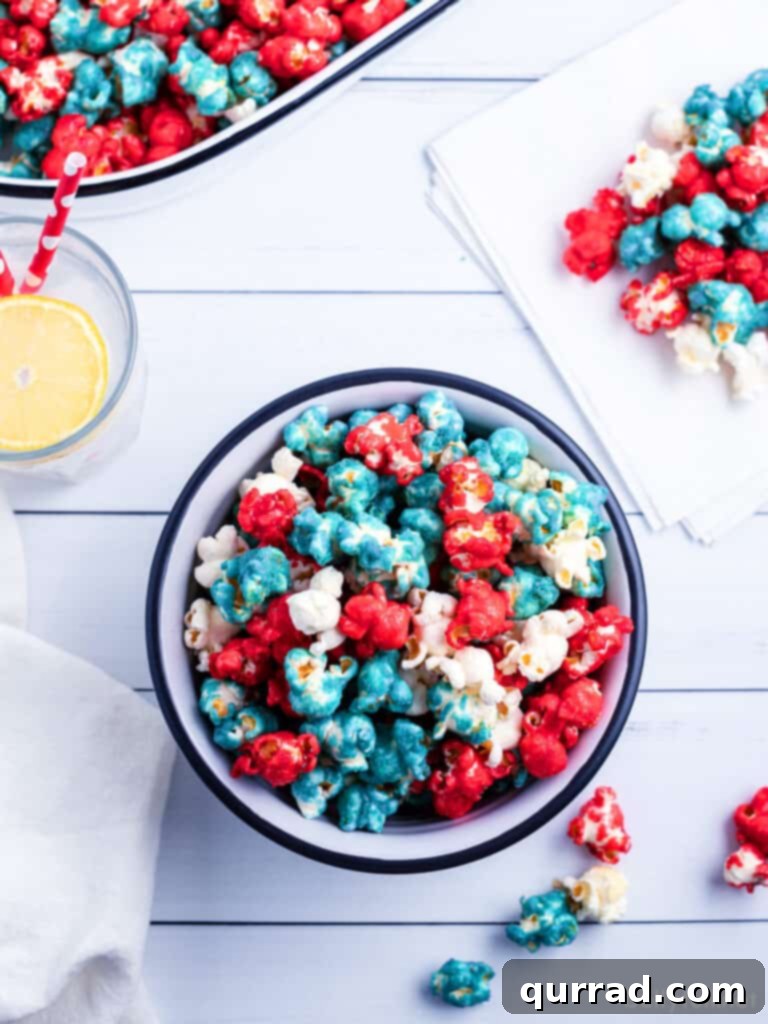 All American Caramel Corn 4 Large bowl filled with red, white, and blue caramel popcorn, showcasing a festive snack for patriotic holidays.