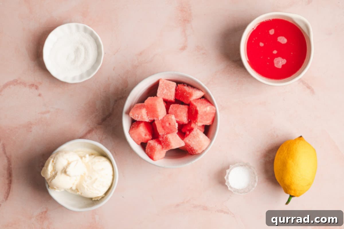 Overhead view of all ingredients needed to make watermelon Dole whip laid out on a table.