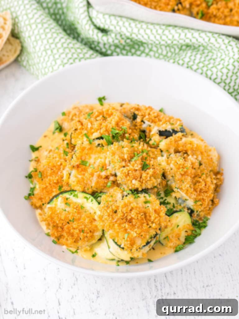 Perfect Cheesy Zucchini Bake 2 A bowl of baked zucchini casserole