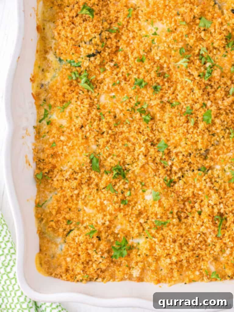 Perfect Cheesy Zucchini Bake 3 Cheesy zucchini casserole in a white baking dish