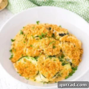Perfect Cheesy Zucchini Bake 6 A bowl of baked zucchini casserole
