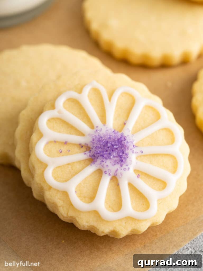 Beautifully decorated cut-out sugar cookie with a detailed flower design
