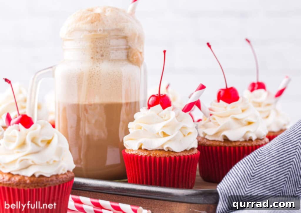 Frothy Root Beer Float Cupcakes 5 tray full of frosted vanilla cupcakes with a Maraschino cherry on top
