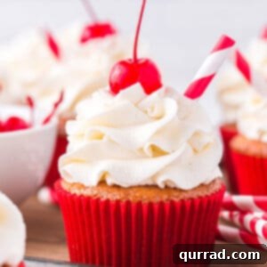 Frothy Root Beer Float Cupcakes 6 root beer float cupcakes with vanilla frosting and a Maraschino cherry on top
