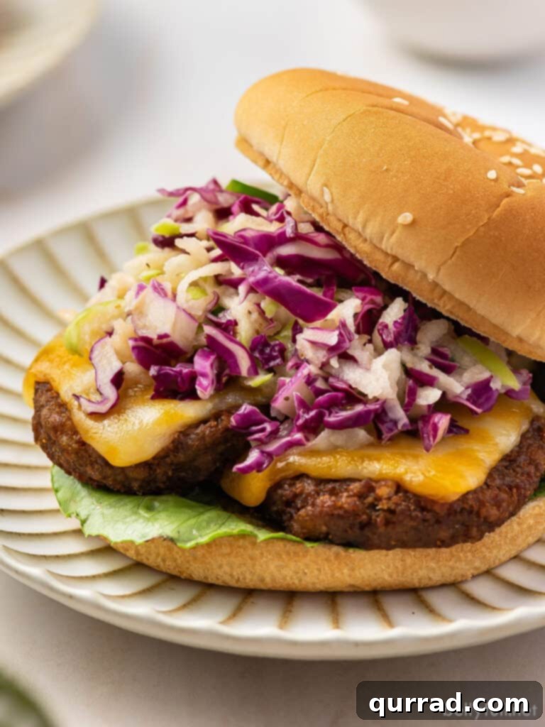 Crimson Cabbage Crunch 4 A juicy burger topped generously with vibrant red cabbage coleslaw.