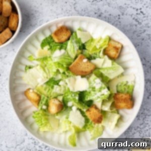 overhead Caesar Salad on white plate