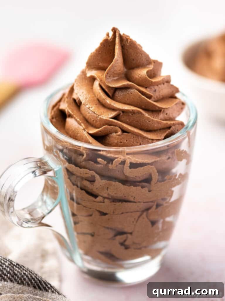 Rich and Creamy Chocolate Frosting 2 chocolate frosting piped tall in a clear glass