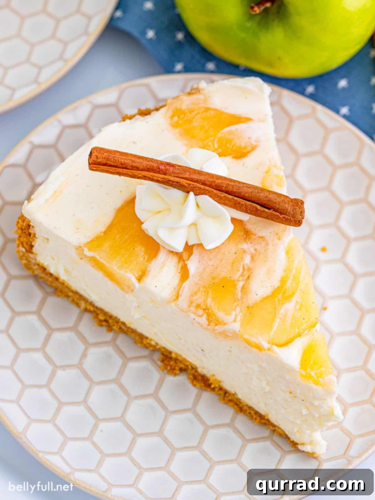 No Bake Apple Pie Cheesecake 3 Overhead view of a beautiful slice of easy no-bake apple cheesecake, ready to be enjoyed.