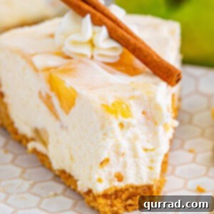 No Bake Apple Pie Cheesecake 6 A slice of apple pie cheesecake on a plate with a bite missing