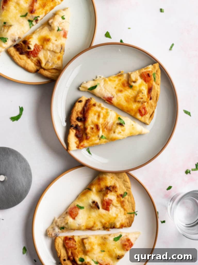 Creamy Chicken Alfredo Pizza 4 Three plates, each with two slices of Chicken Alfredo Pizza