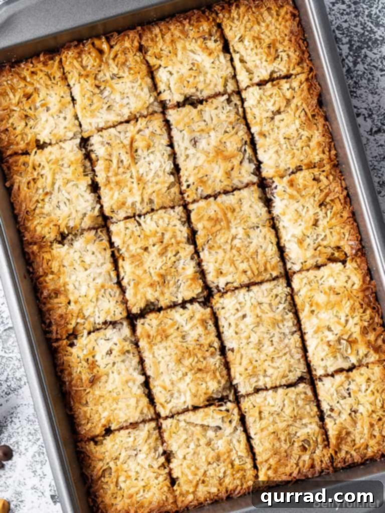 Magic Bars 2 sliced 7 layer bars in baking pan